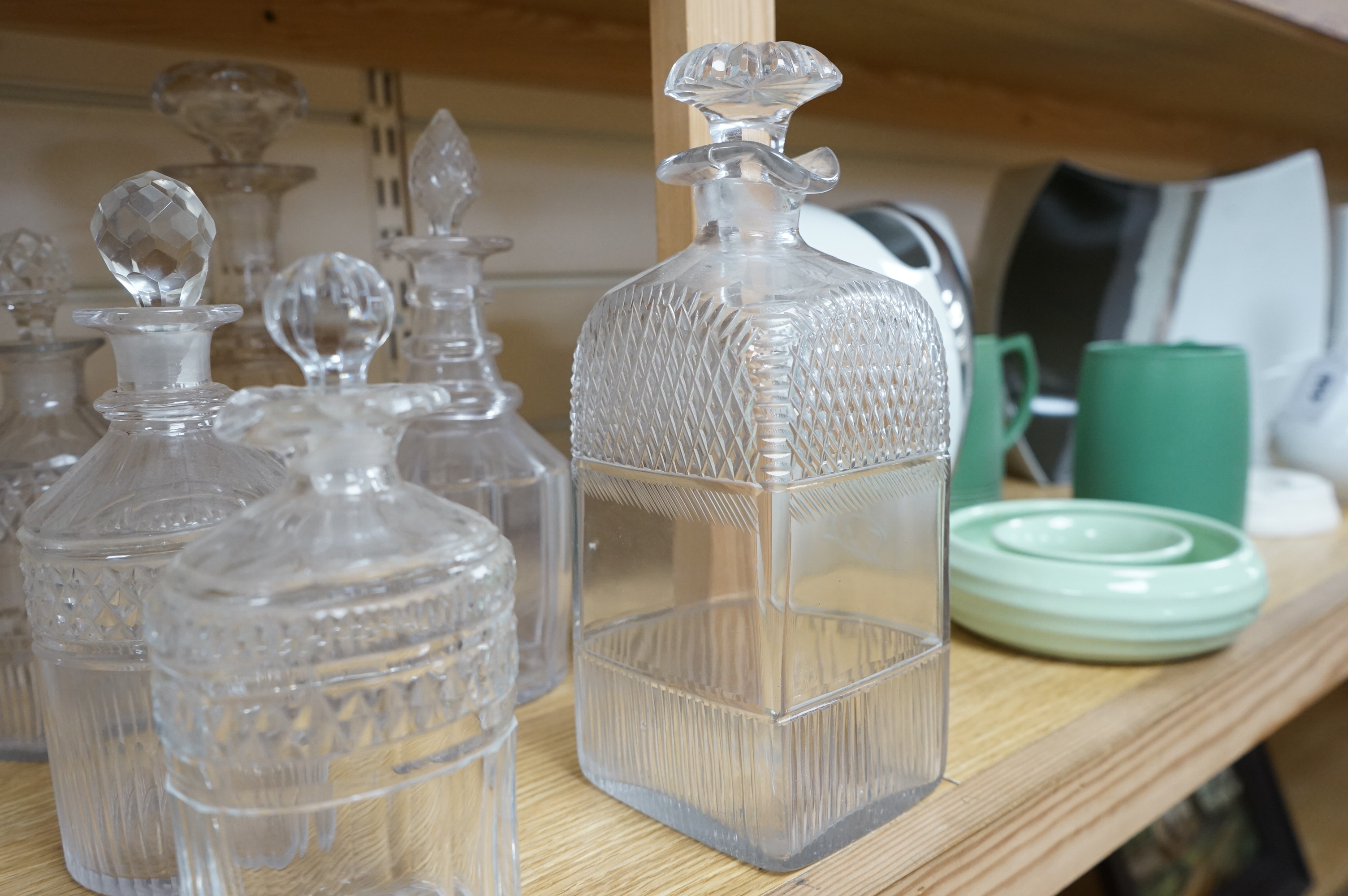 A collection of assorted drinking glassware including sets of decanters and a large etched glass goblet, largest 27cm high